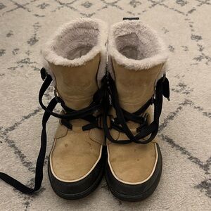 Sorel Tan and Black Winter Boots